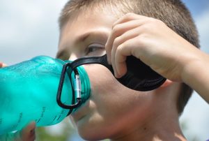 drinking from a bottle